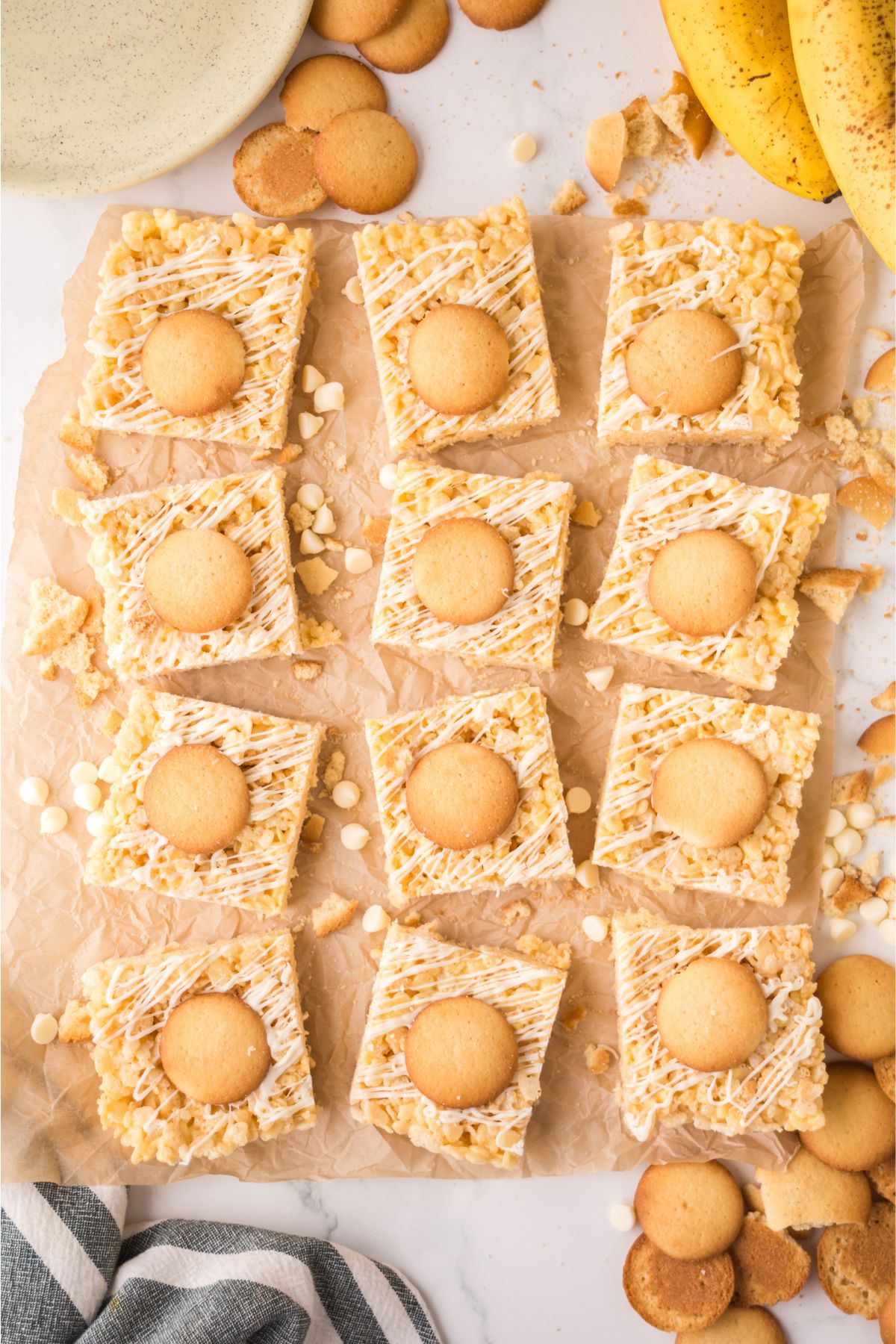 Rice krispie cut into pieces on a parchment paper.