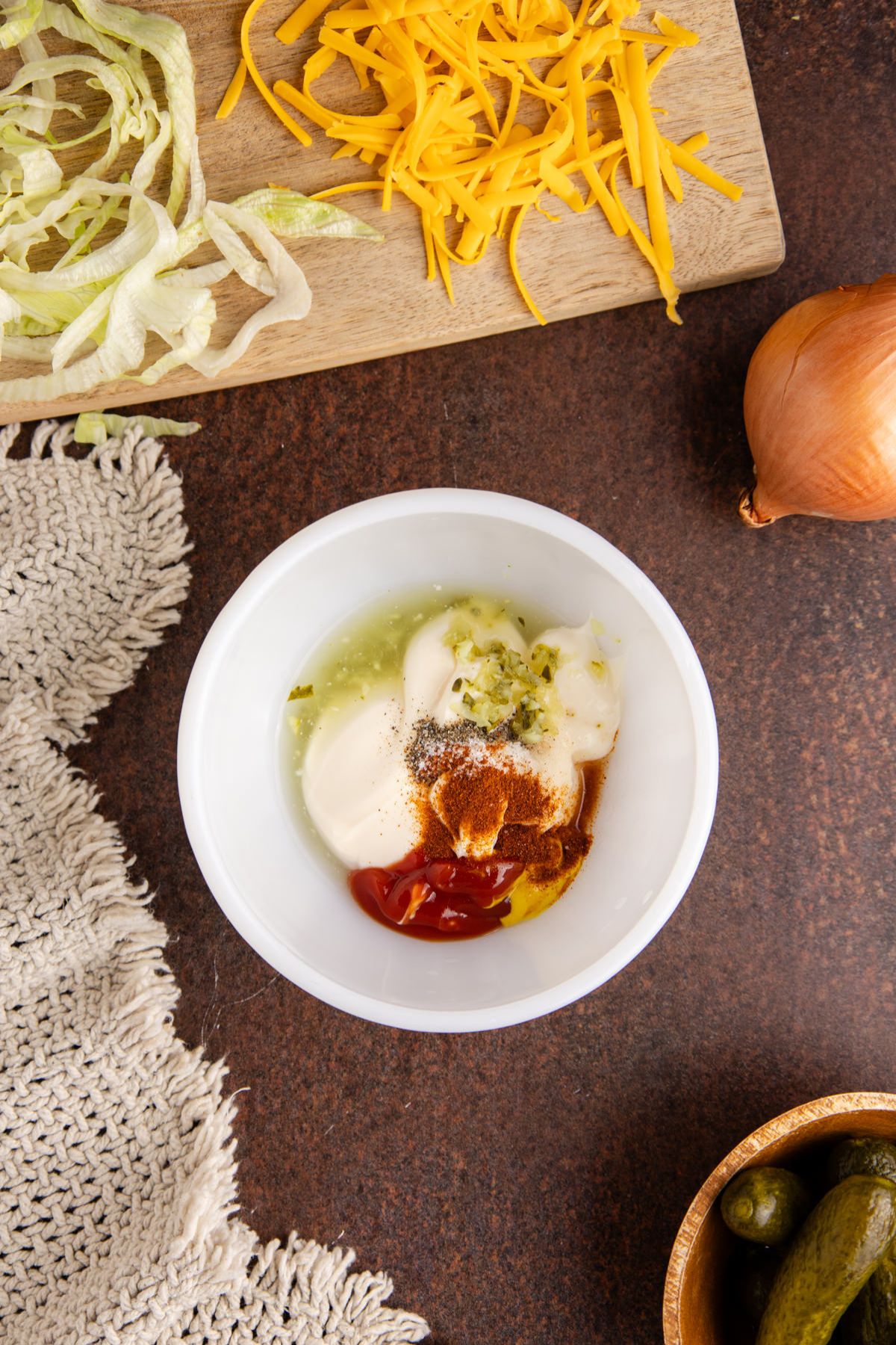 Ingredients for the big mac sauce in a bowl.
