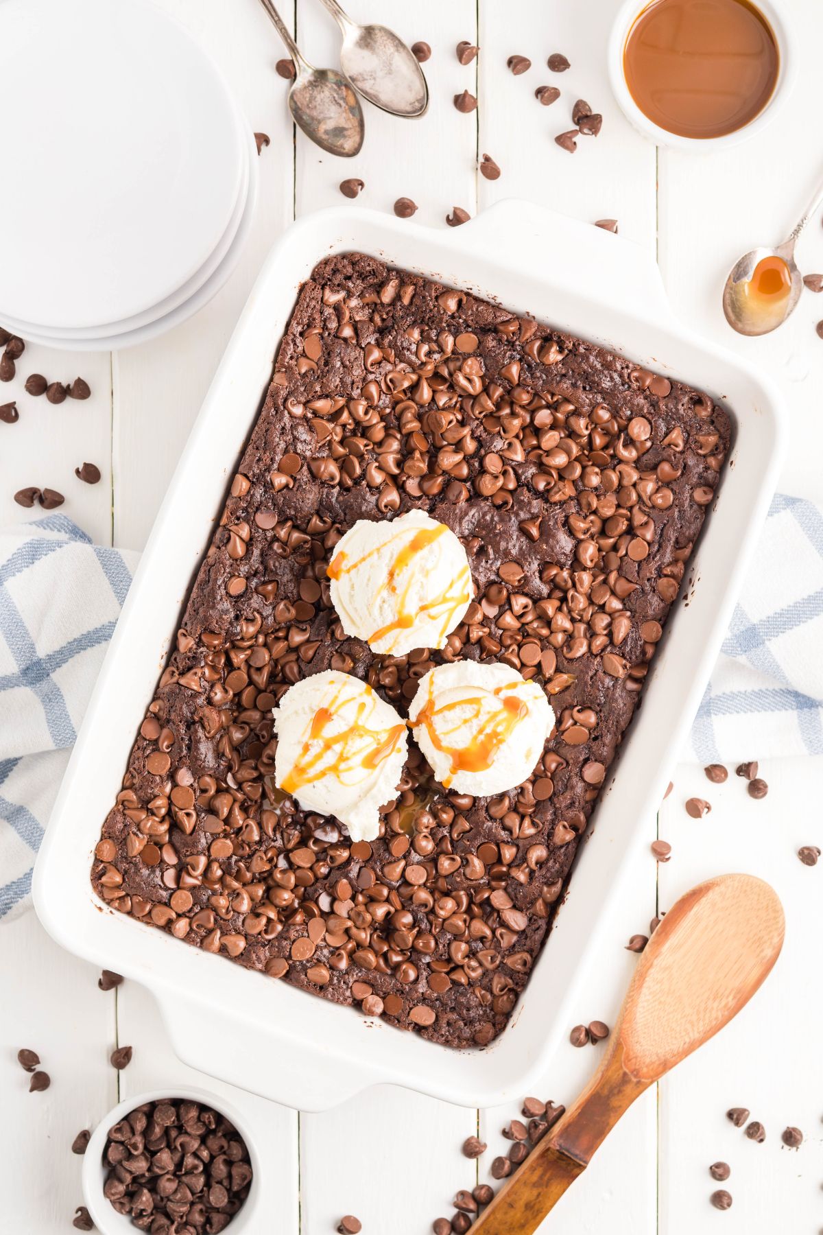 The finished cake in a baking dish with ice cream.