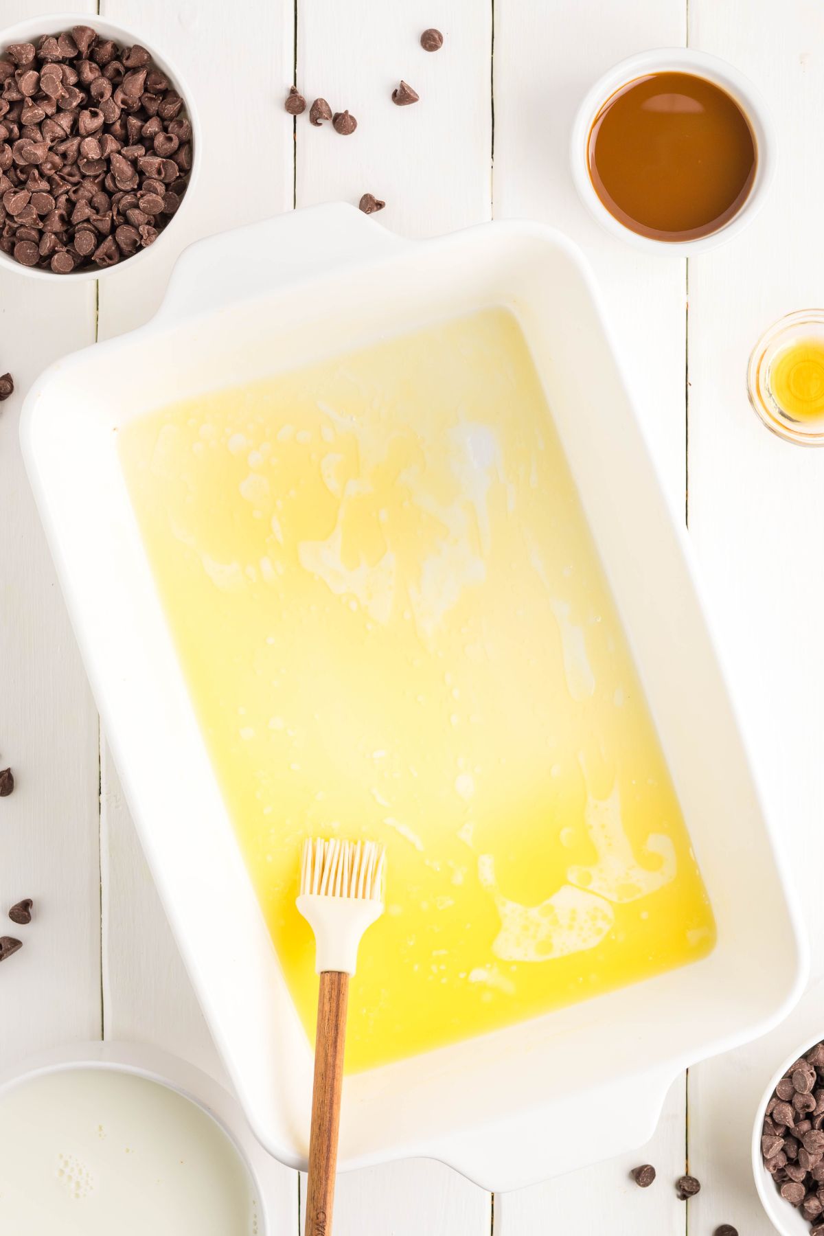 Butter melted and spread in the baking dish.
