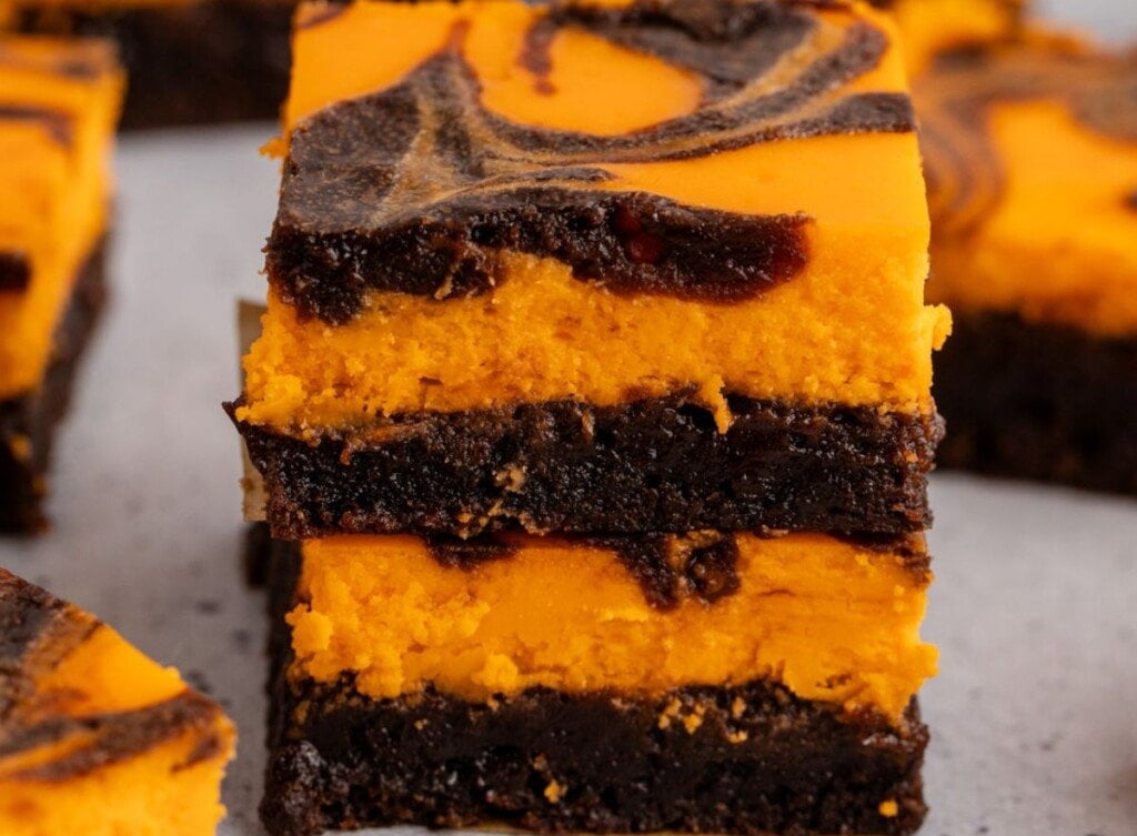 Two brownies on top of each other.
