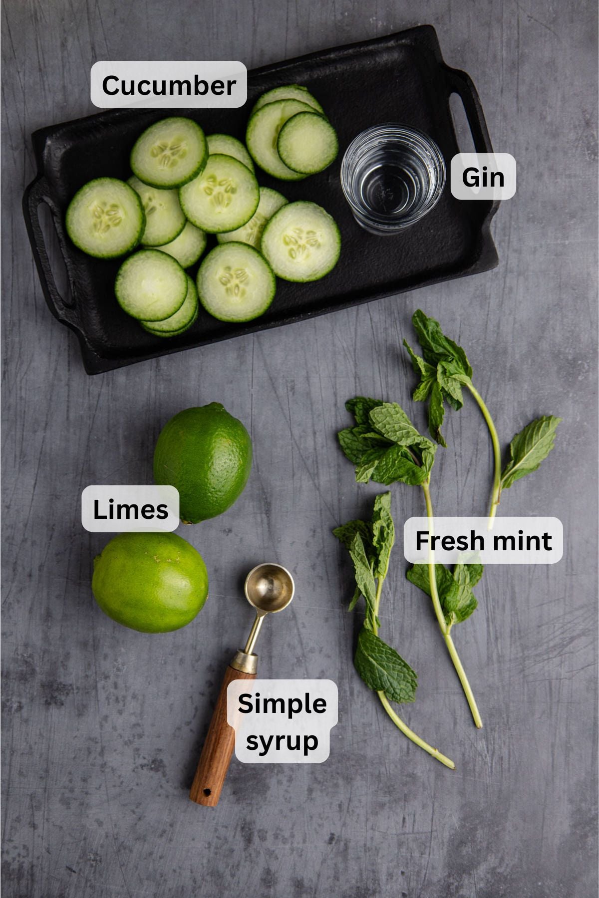 All of the ingredients needed to make and East Side Cocktail on a table.