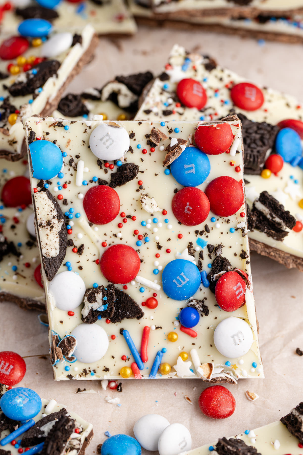 One piece of chocolate bark leaned against others in the background.