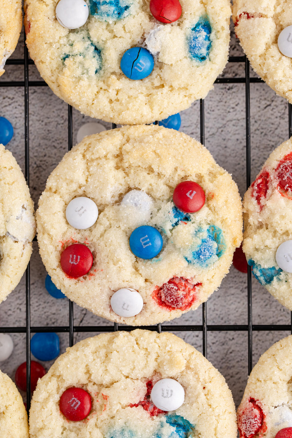 Baked cookies on a cooling rack.