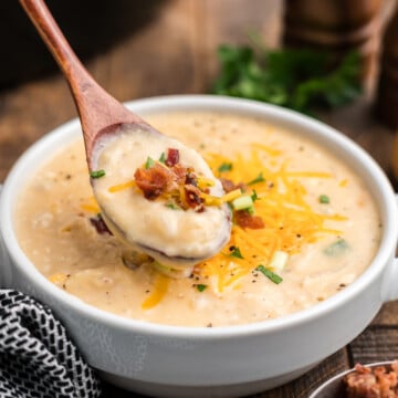 Crock pot hash brown potato soup in bowl.