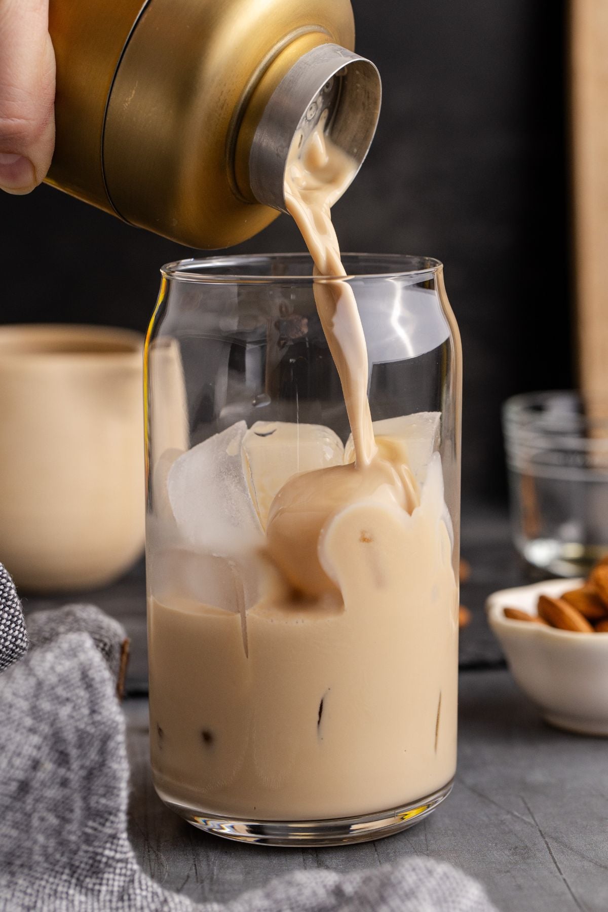 shaken Cocktail served over ice with a cinnamon garnish.