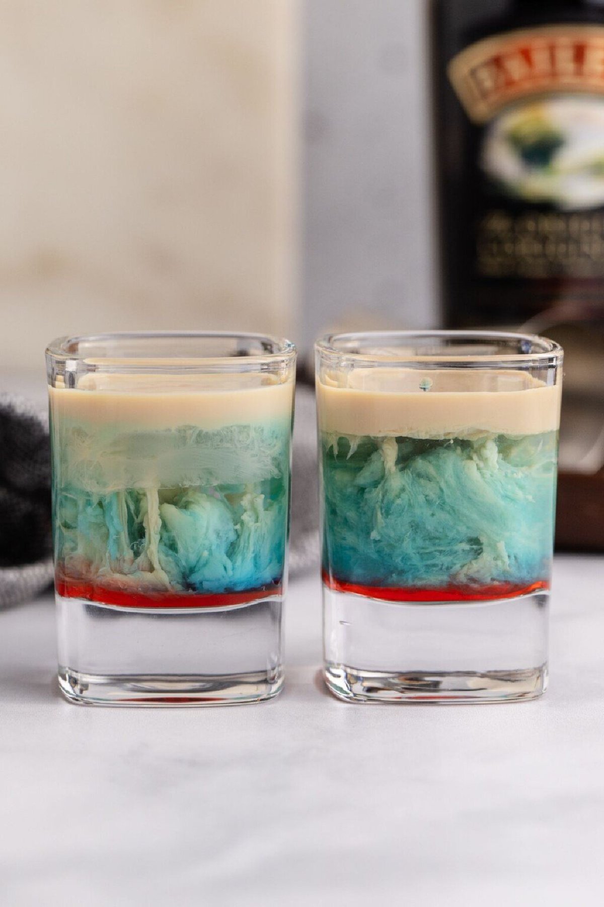 Two shots side by side on table.