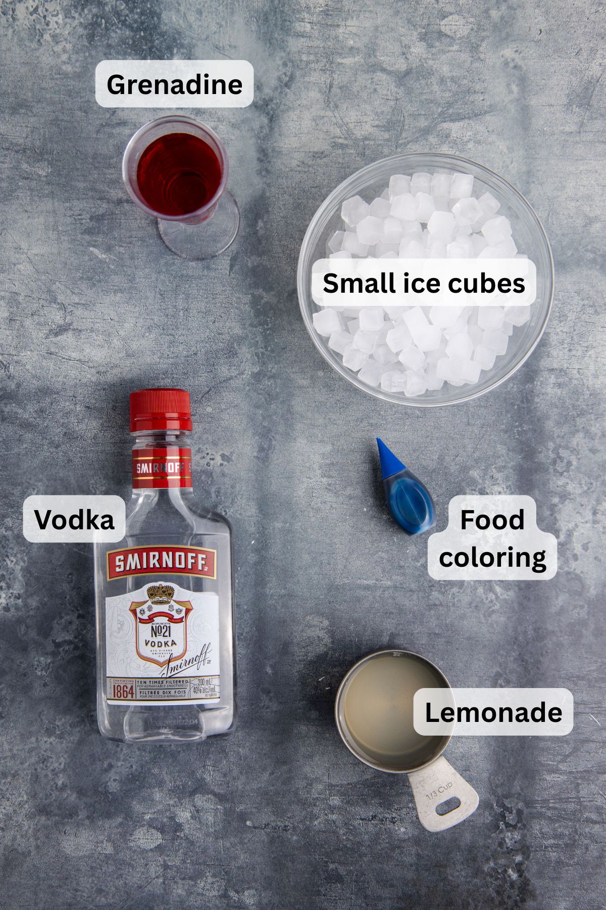 Ingredients for Bomb Pop Cocktail on a table.