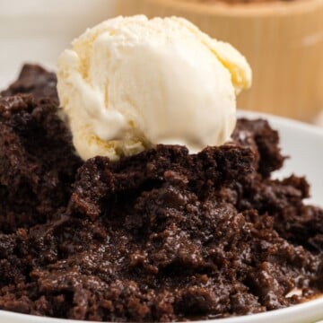 Chocolate cobbler served with a scoop of vanilla ice cream.