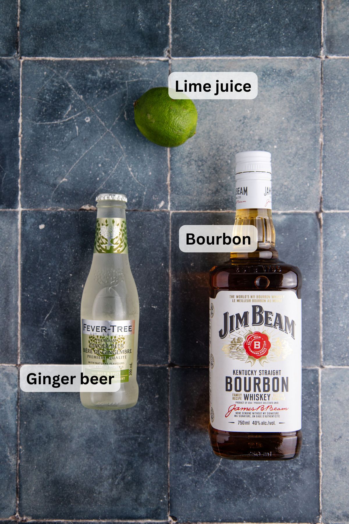 All of the ingredients needed to make a Kentucky Mule Cocktail on a table.