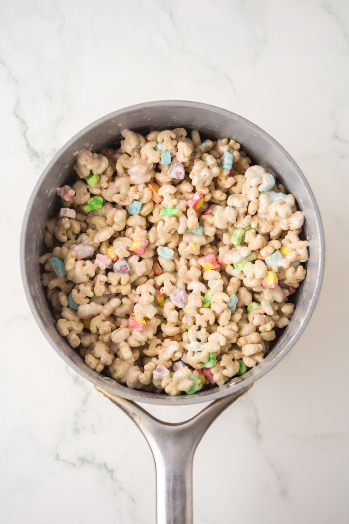 Lucky Charms cereal folded into the butter and marshmallows.