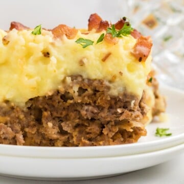 A serving of meatloaf casserole on a plate.
