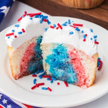 Easy Poke Cupcakes on a plate cut in half