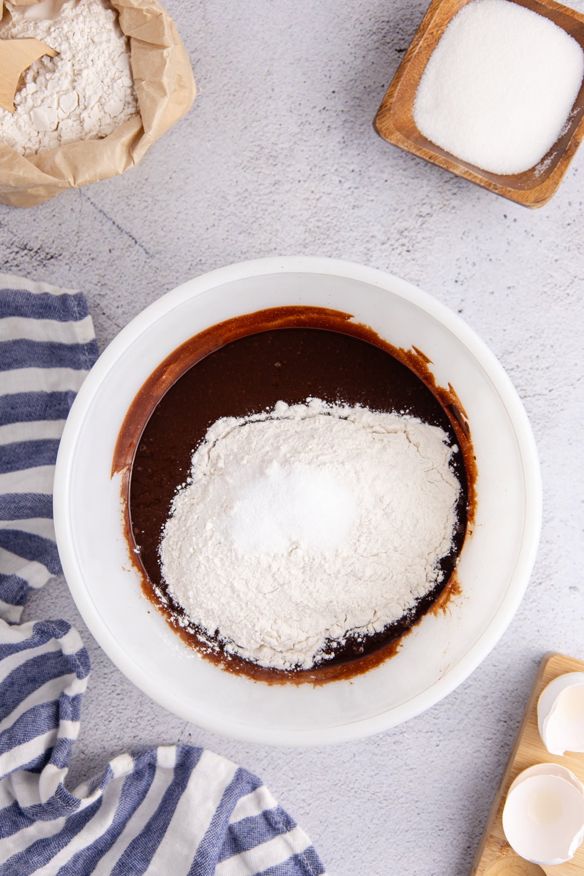 Flour and sea salt mix into the batter.