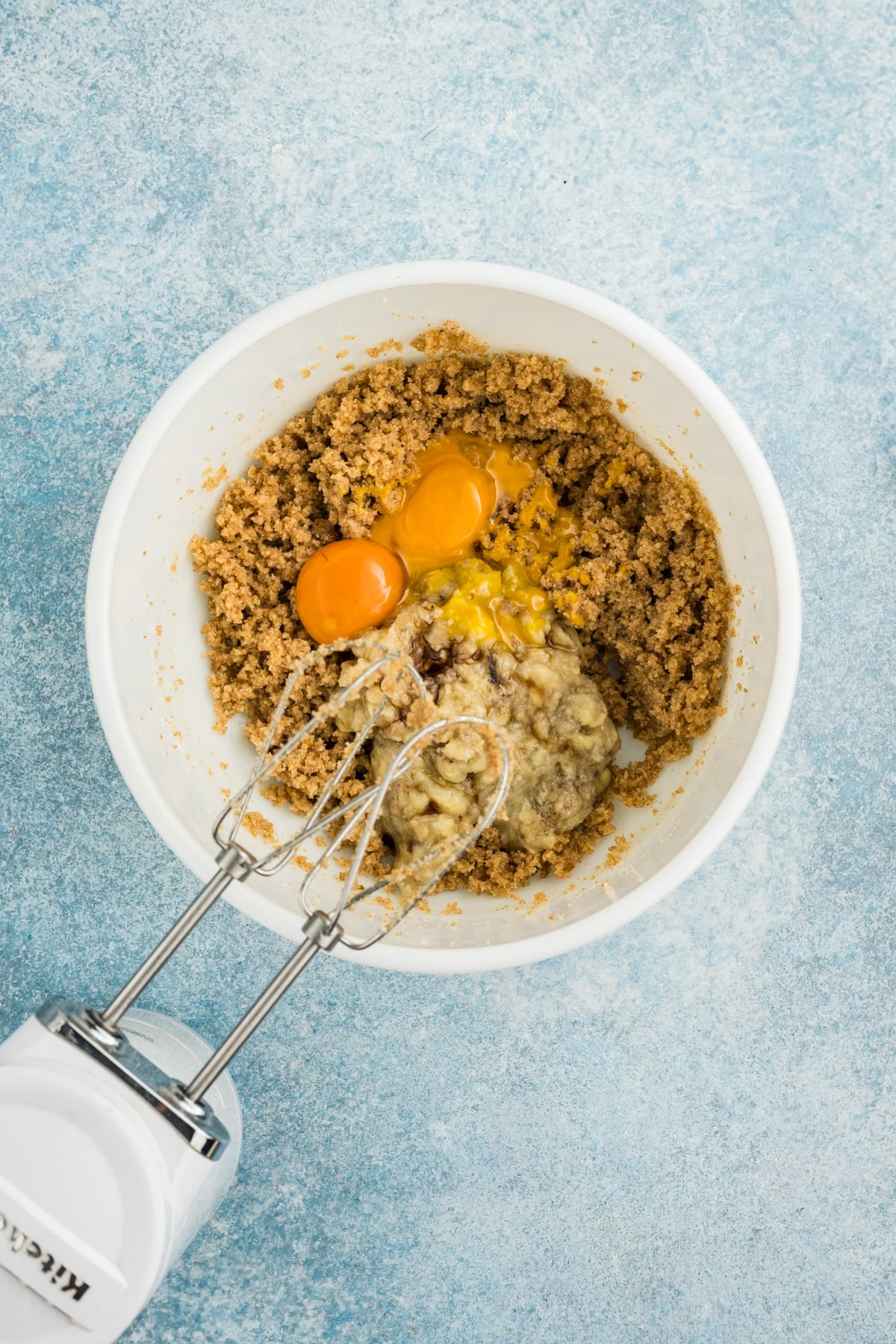 Butter and sugar mixed with the bananas, egg yolks, and vanilla.