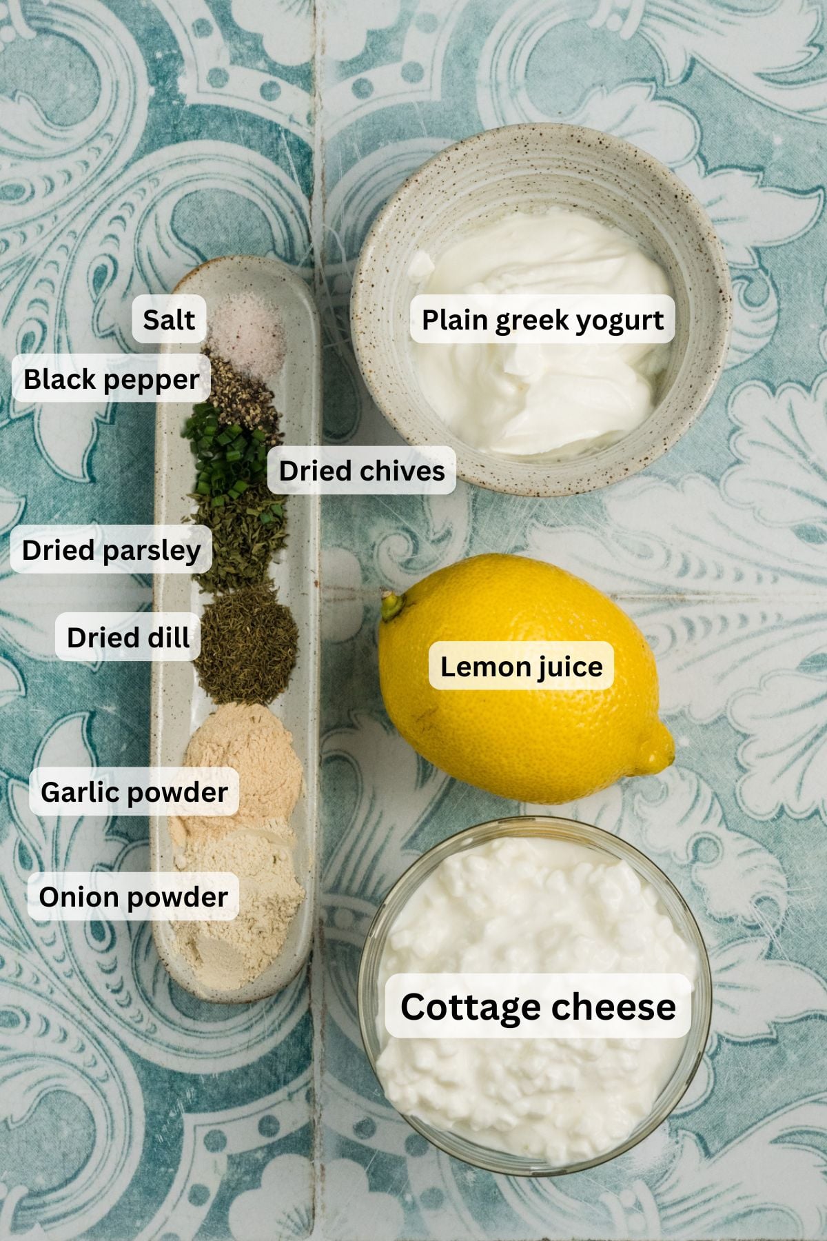 All of the ingredients needed to make Cottage Cheese Ranch Dip in bowl on a table.