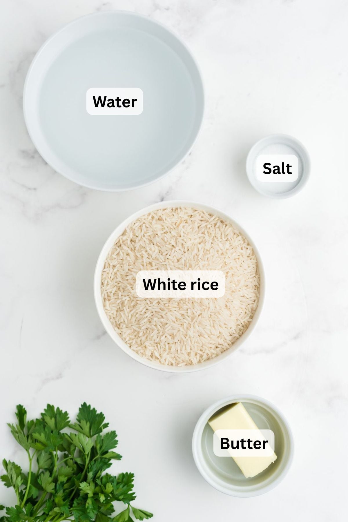 Ingredients to make this rice in the crockpot in bowls on a table.