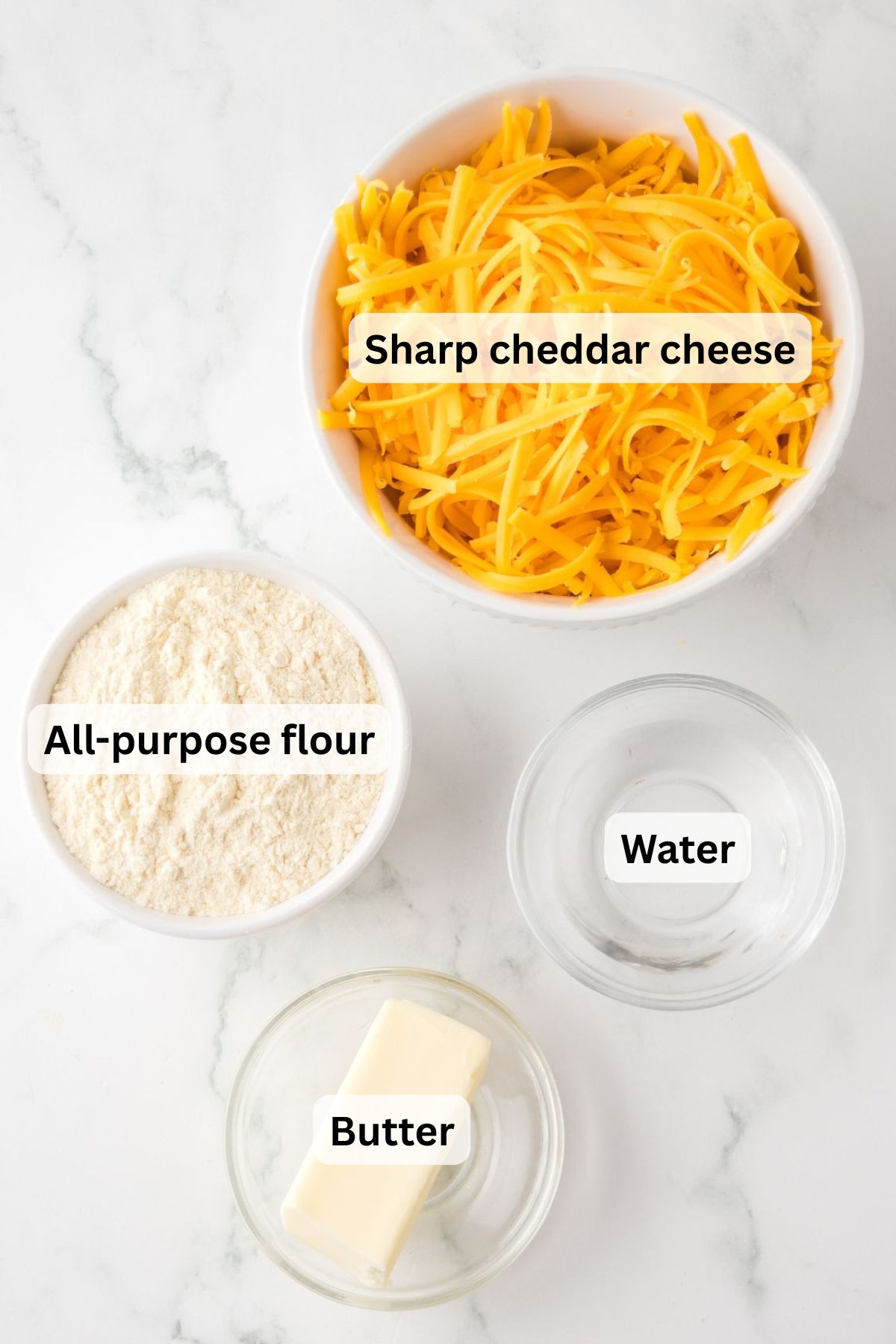 All of the ingredients needed to make a homemade cheez its.