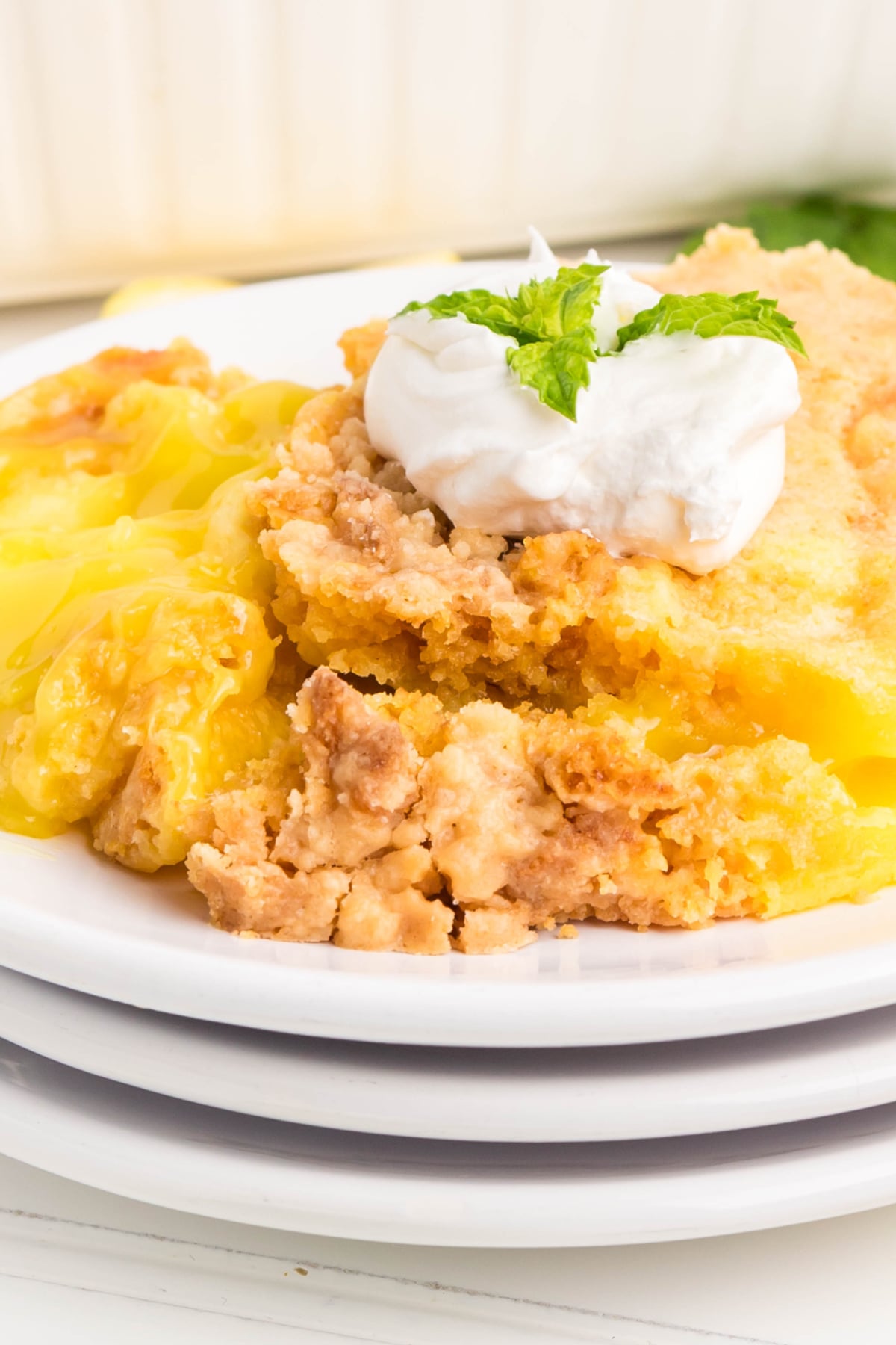 Lemon dump cake on plates.