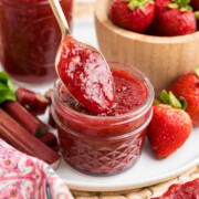 Strawberry rhubarb preserves in a jar.