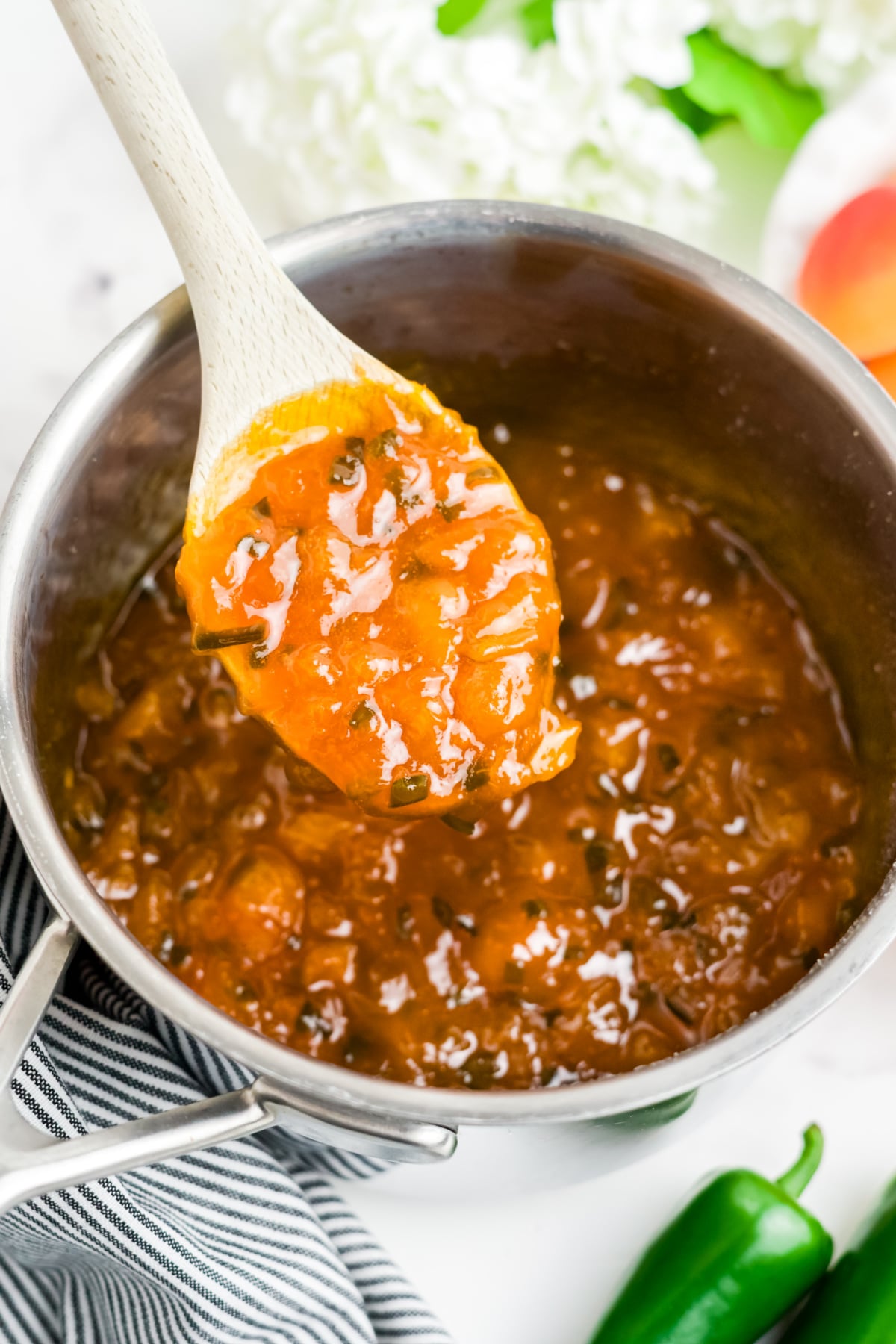 The jam cooling in a pot.