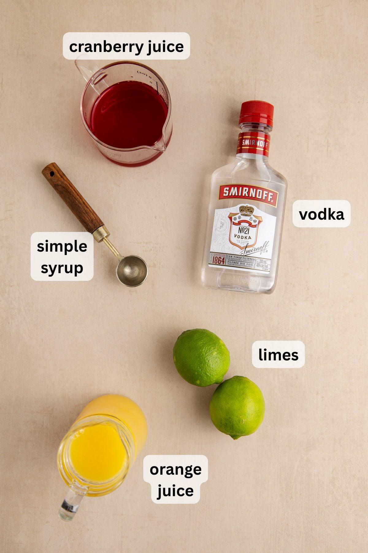 All the ingredients needed to make a Madras Cocktail on a table