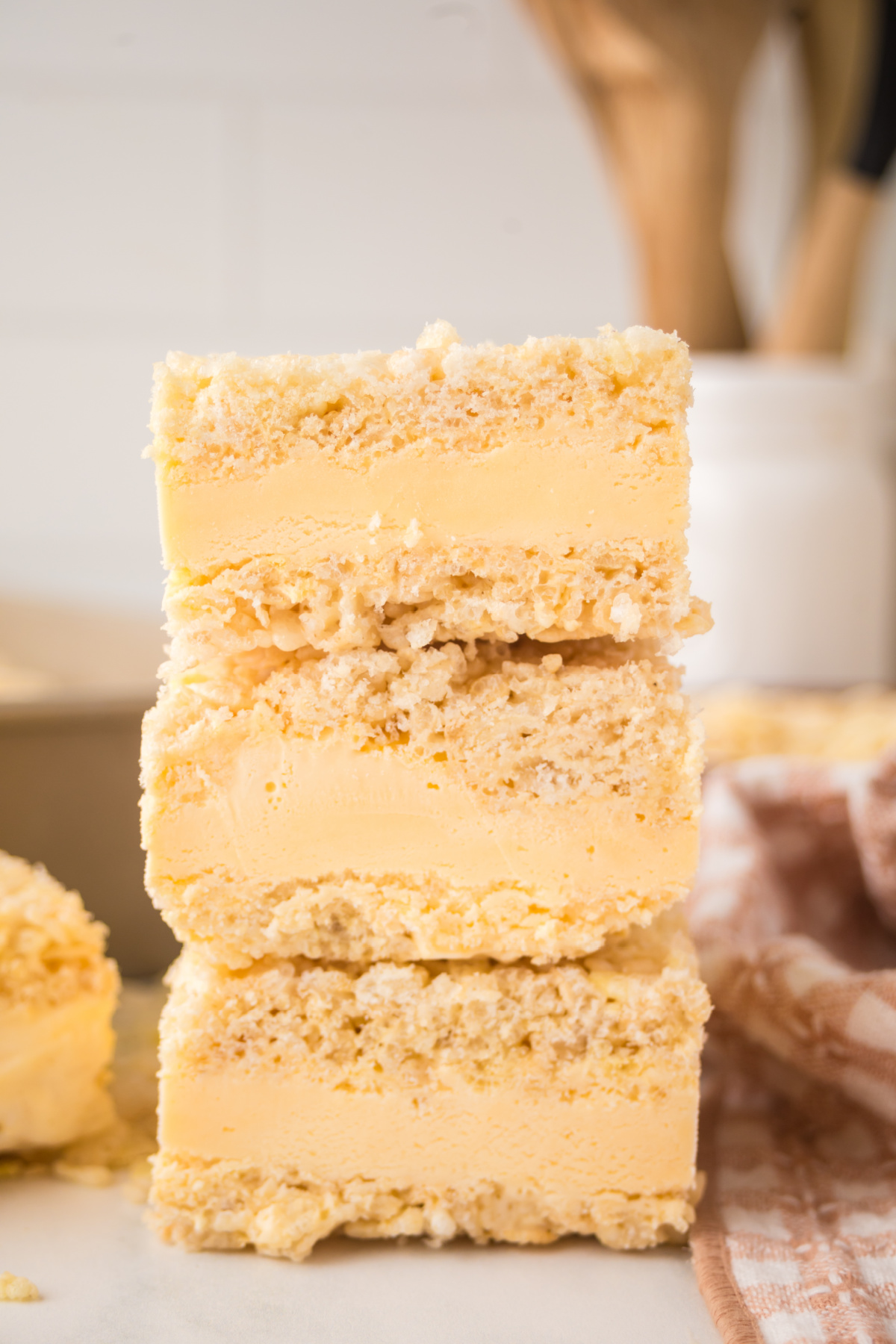 A stack of ice cream sandwiches on a table.