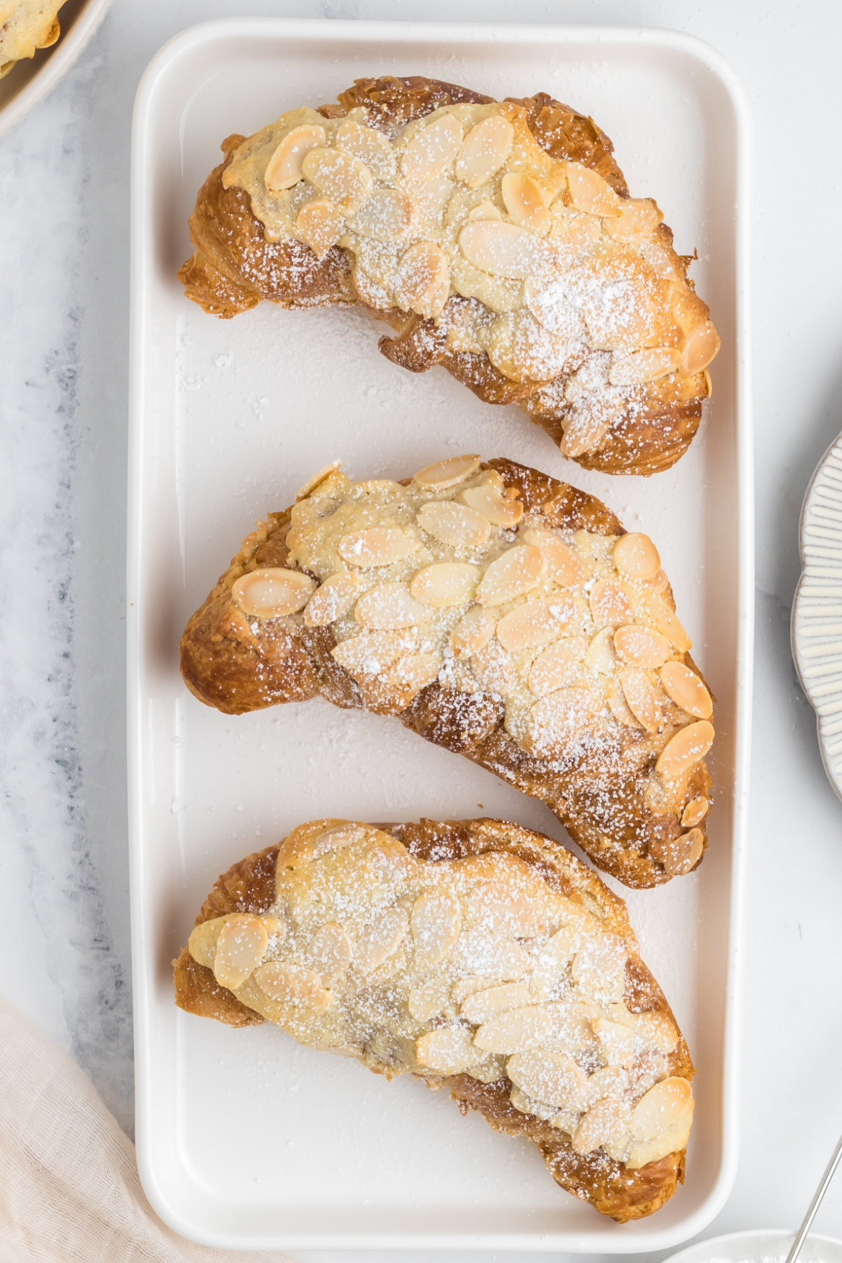 Croissants topped with the almonds and baked.