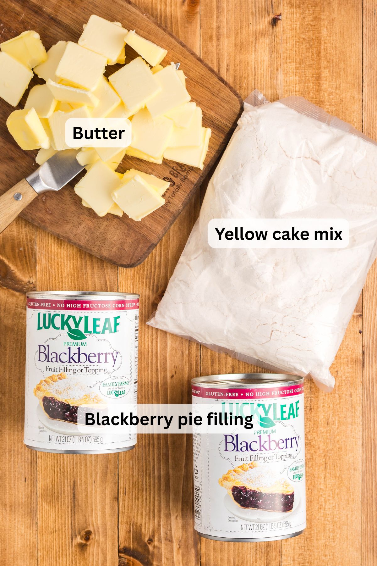 Ingredients to make this blackberry dump cake on a table.