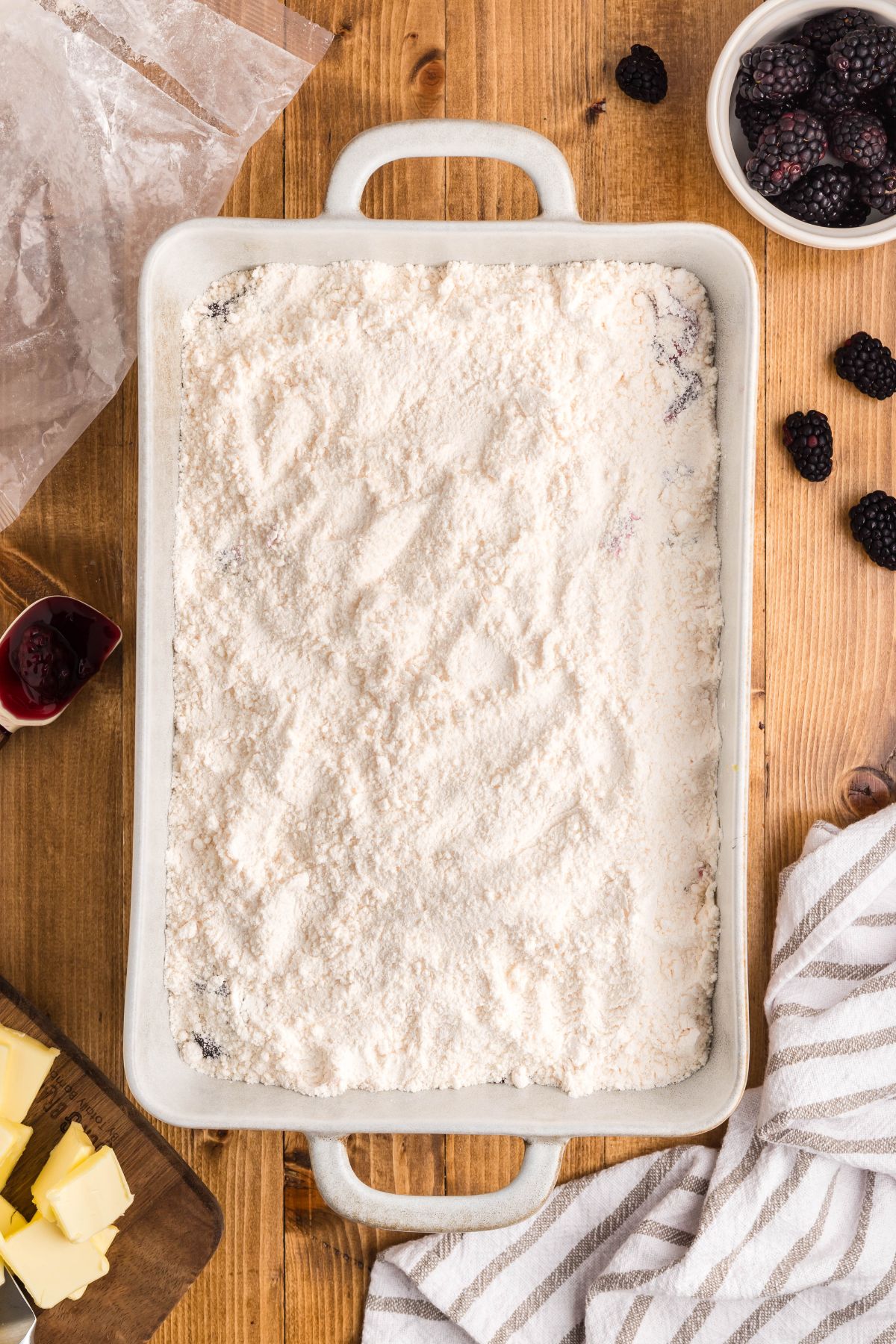 Boxed cake mix on top, covering the pie filling.