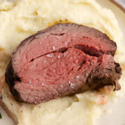 Reverse sear beef tenderloin over mashed potatoes.