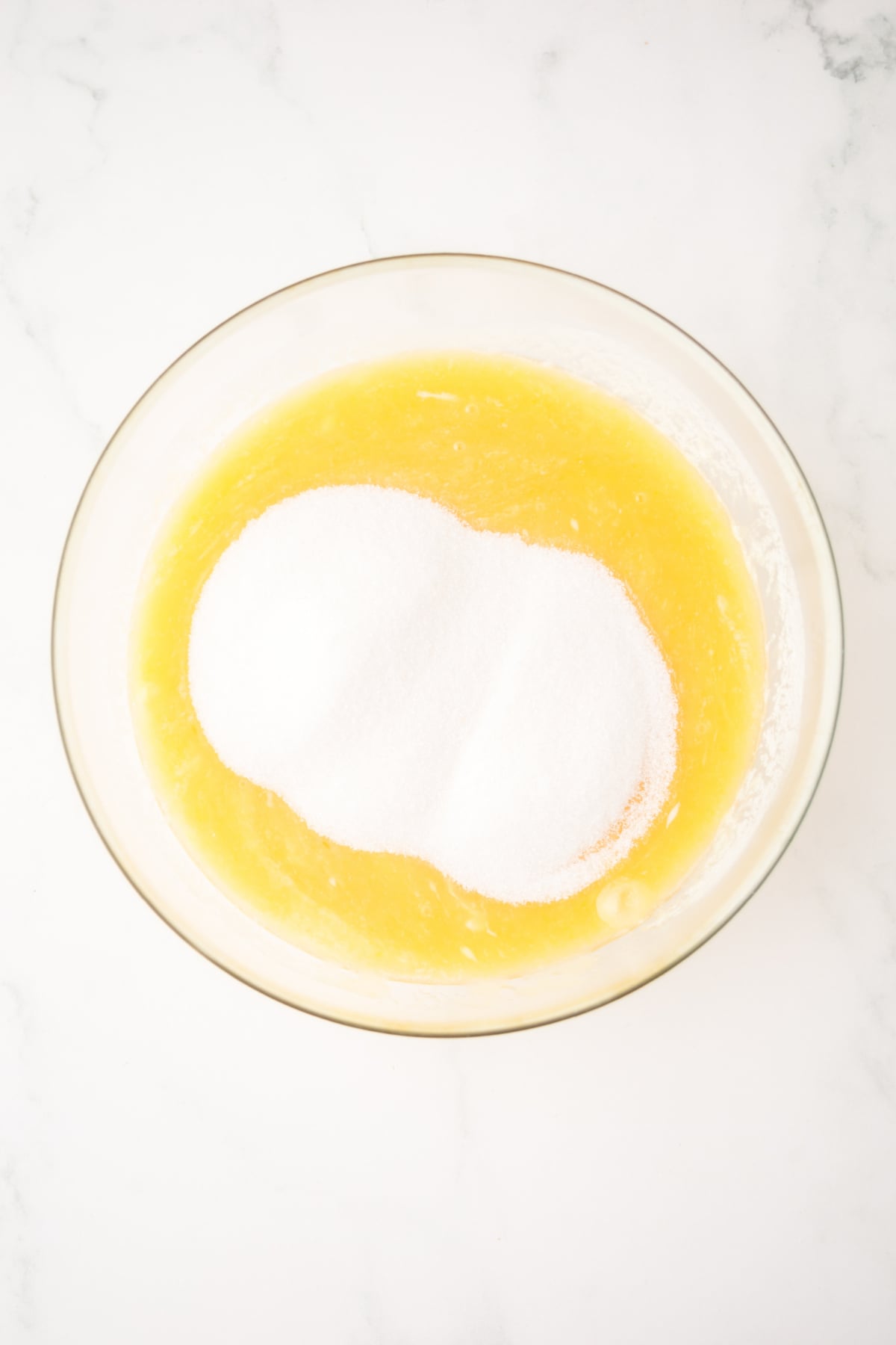 Sugar added to the egg mixture.