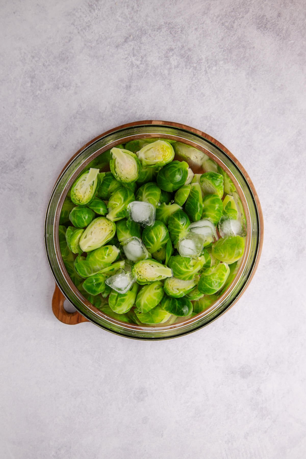 Brussels sprouts put in an ice bath to cool.