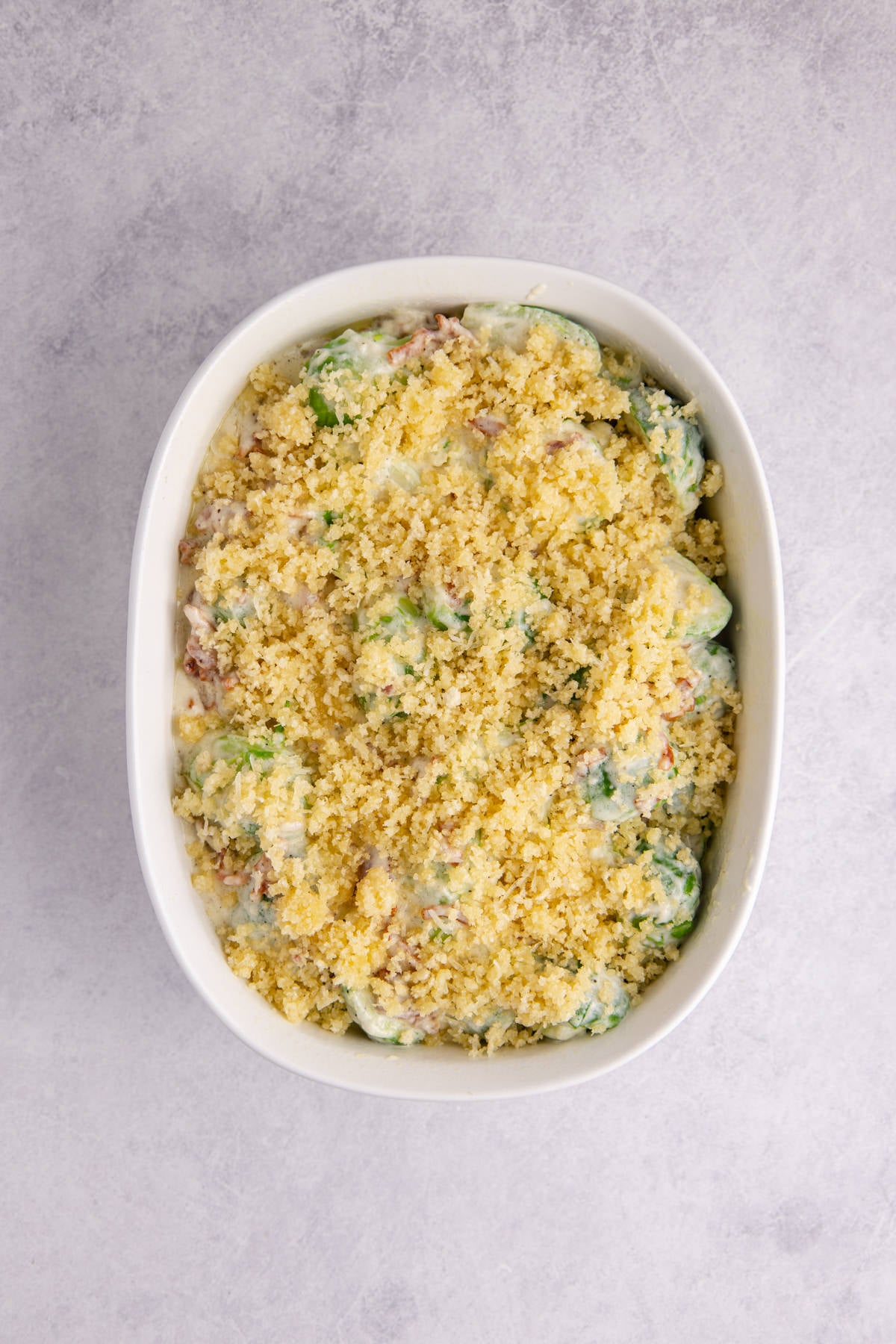 Panko, parmigiano reggiano, and melted butter sprinkled on top.