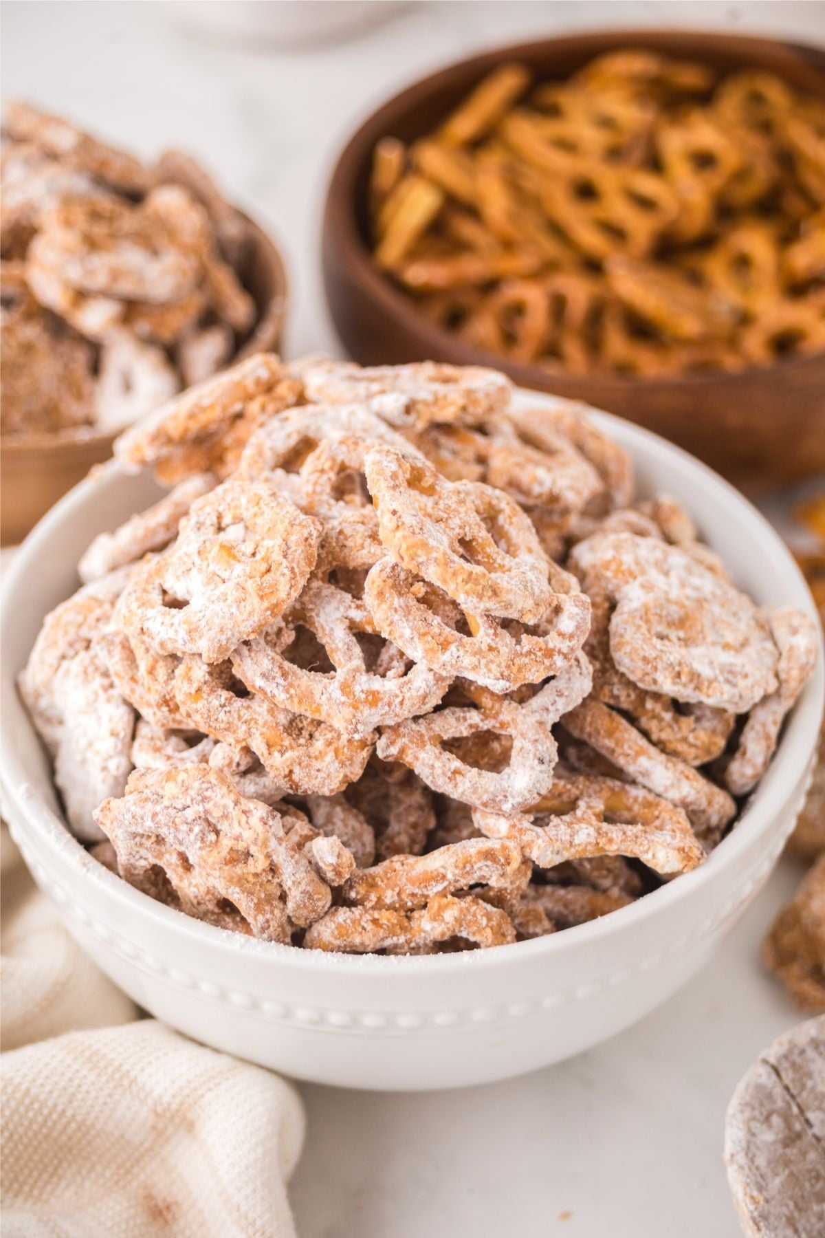 A bowl full of pretzels on a table.