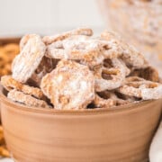 A bowl full of Butterscotch Pretzels on a table.