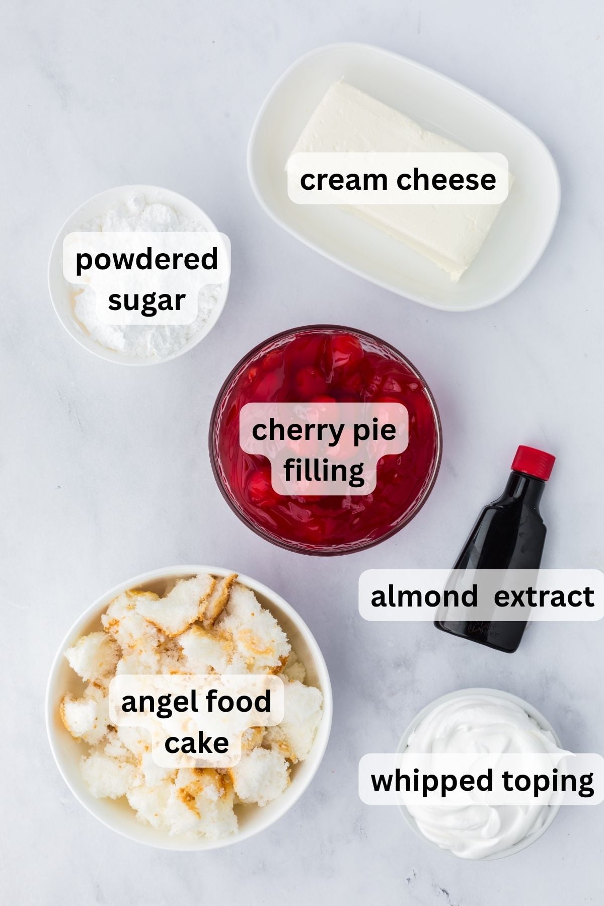 Ingredients to make this dessert in bowls on a table.