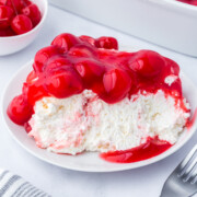 Cherries in the snow dessert on a plate.
