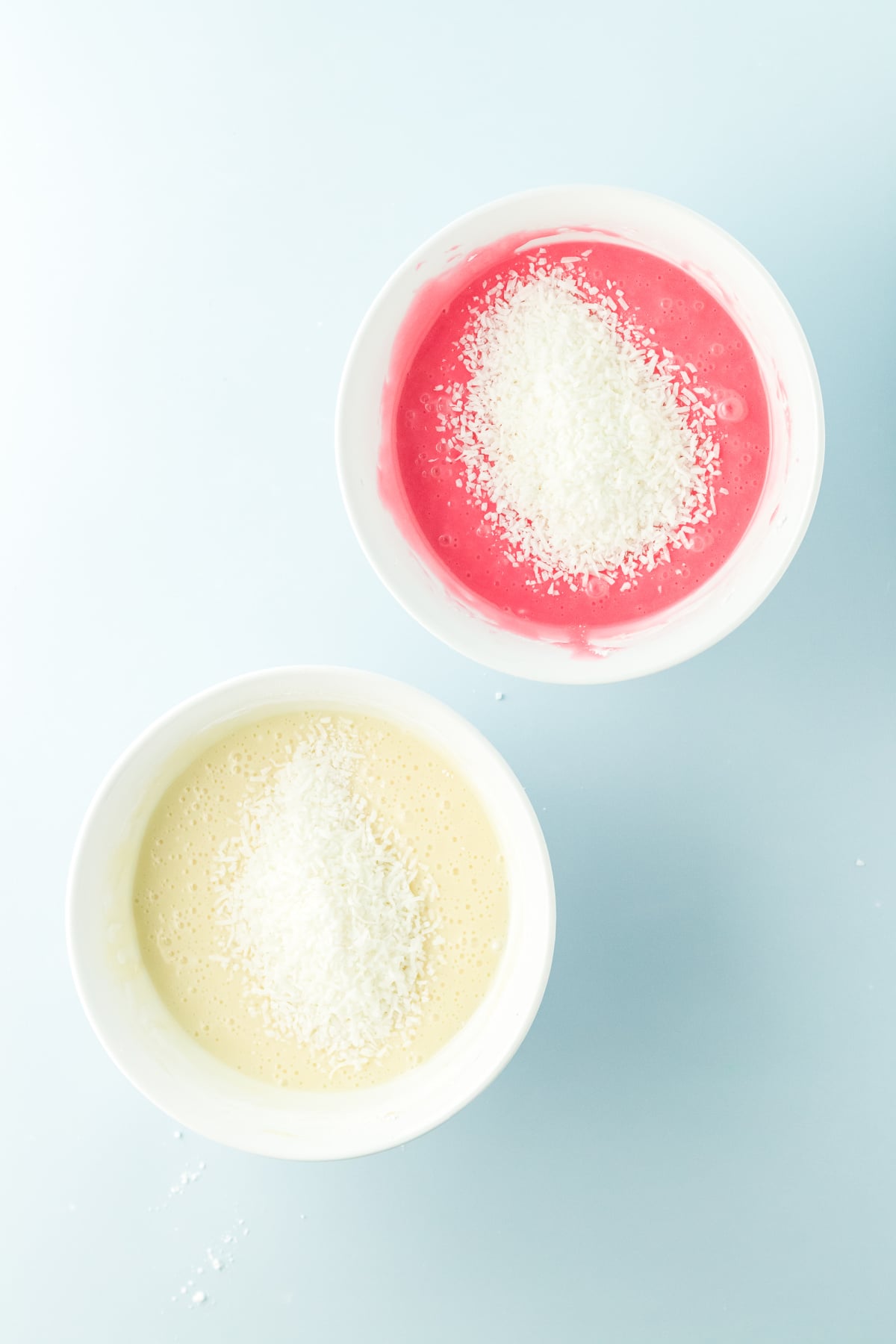 Coconut divided between both mixtures.