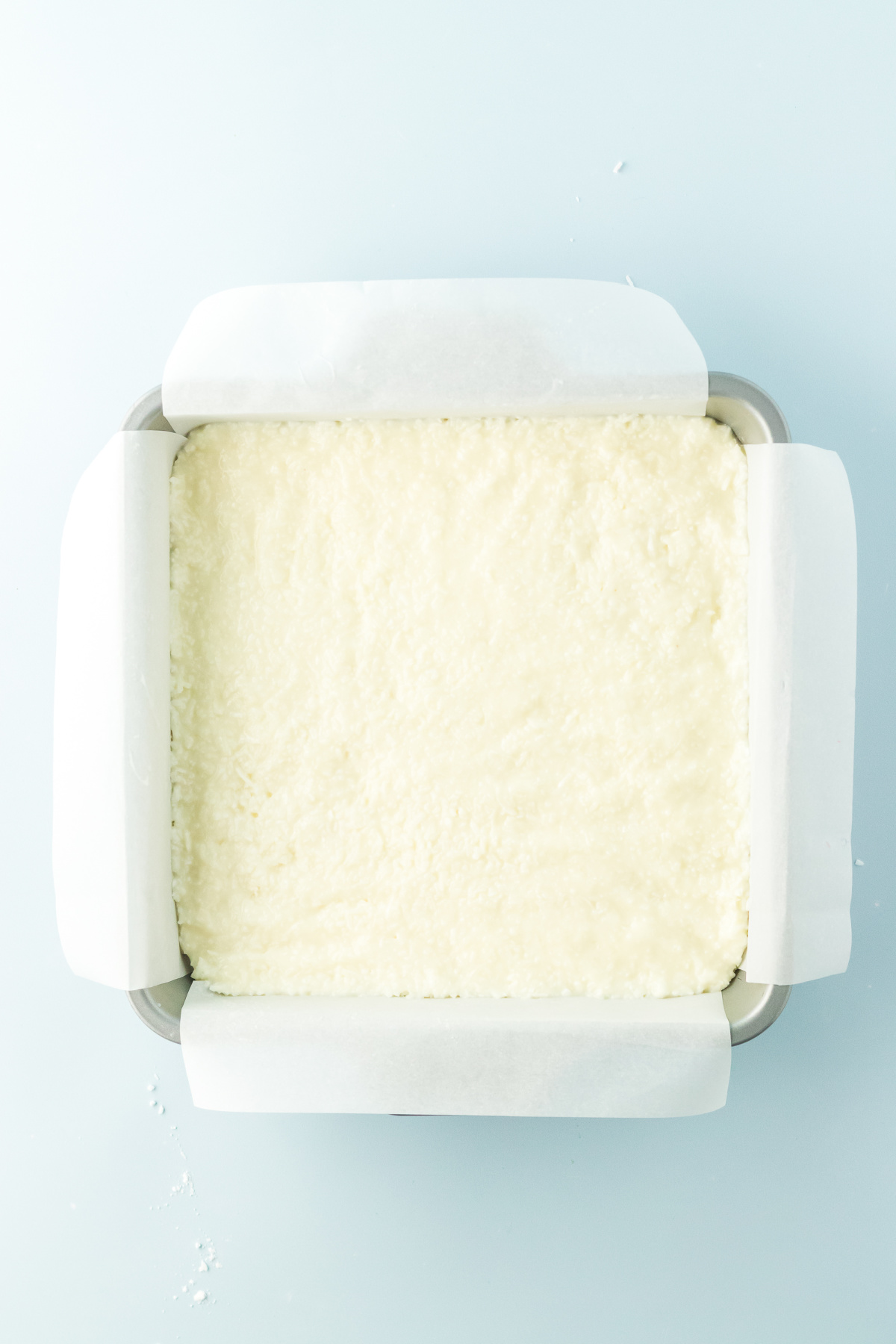 White mixture pressed into the pan.