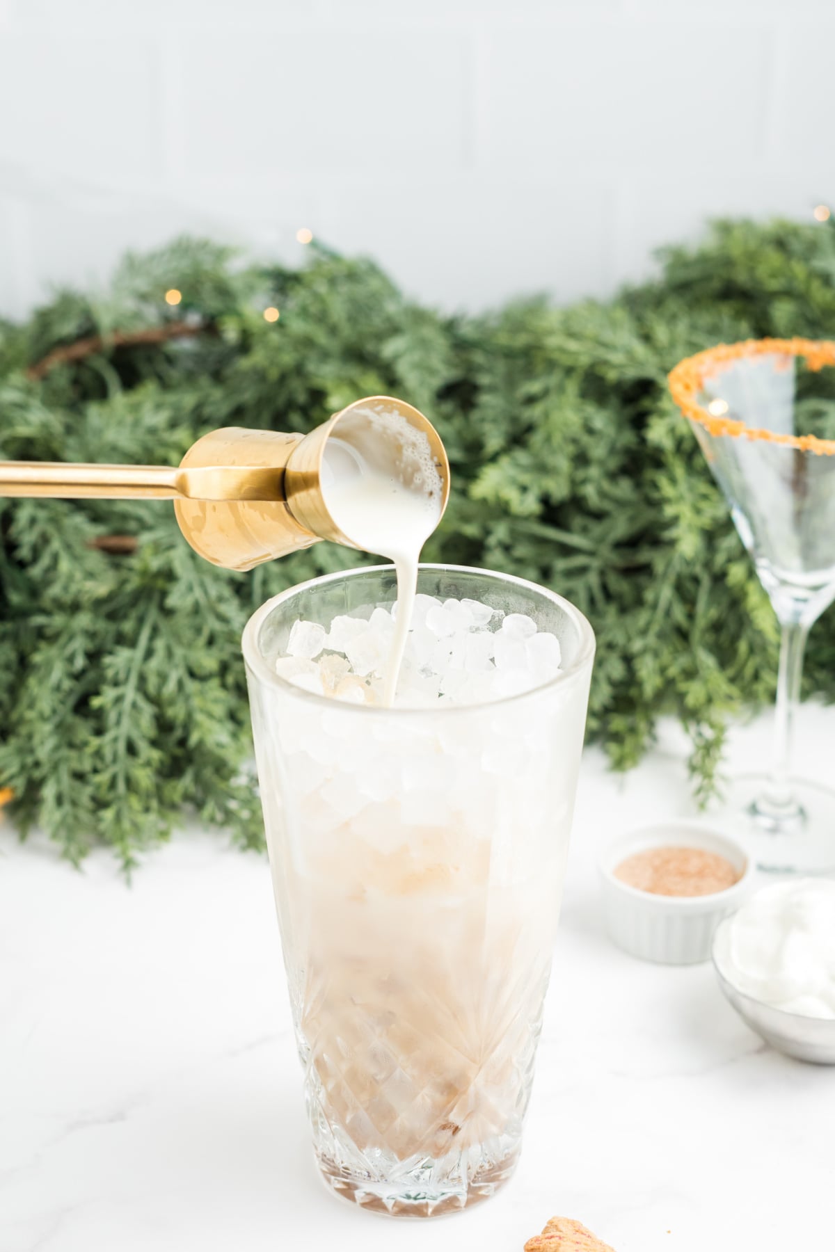 All of the ingredients for the cocktail add to the cocktail shaker with ice.