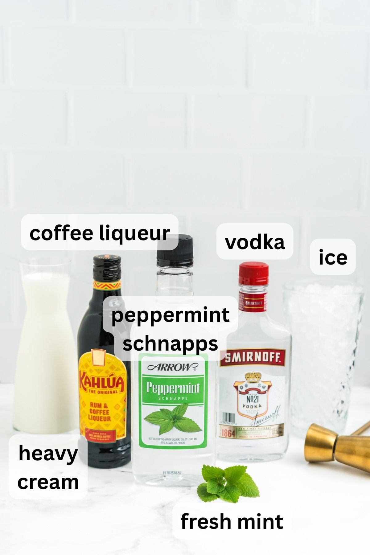 A glass filled with a peppermint white russian.