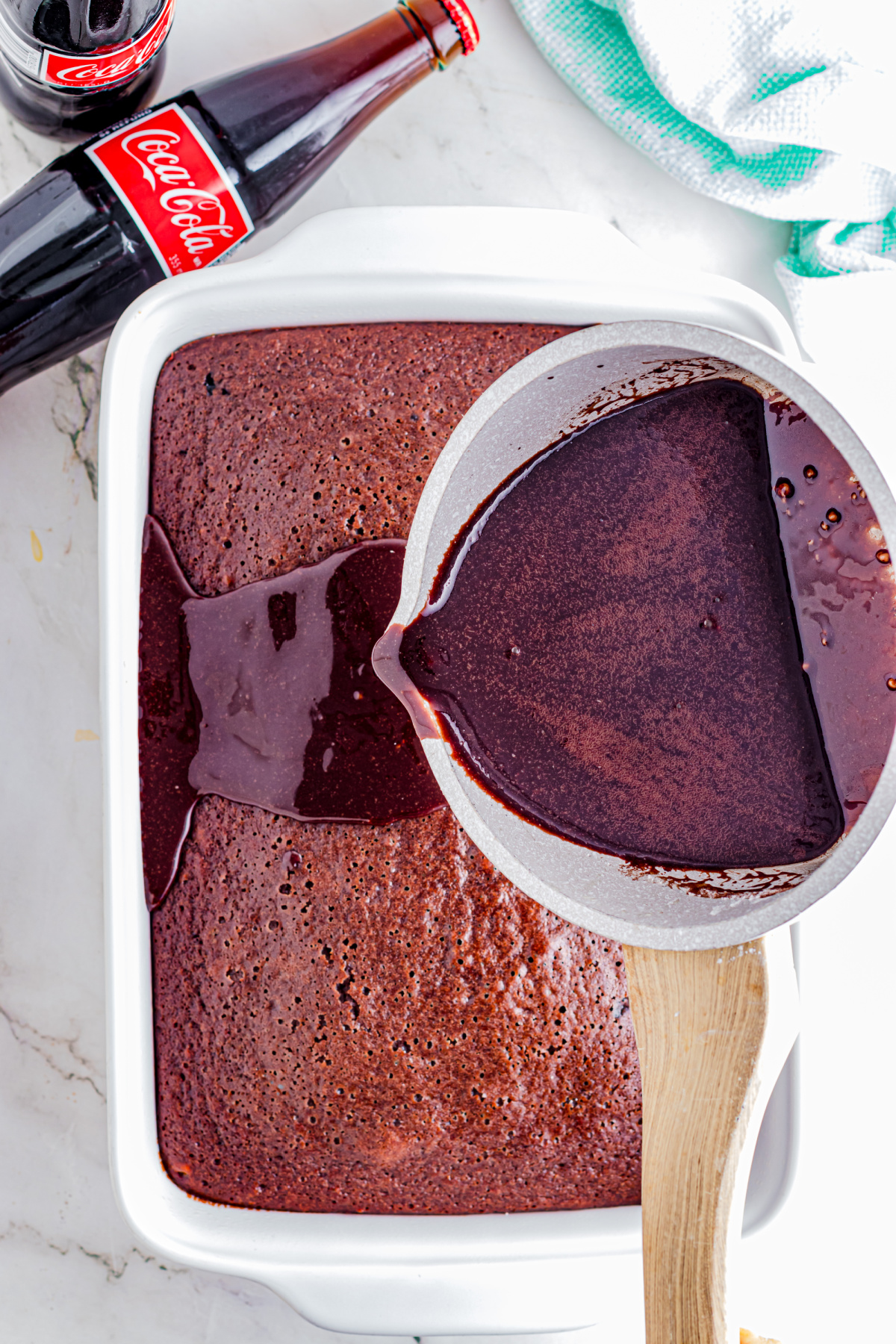 Glaze poured over the cake.