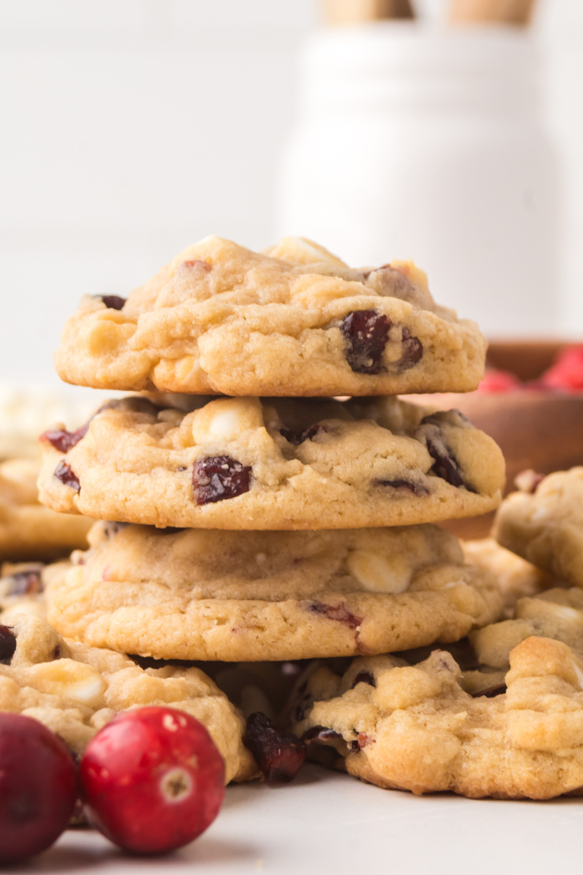 Cranberry cookies stacked on top of each other.