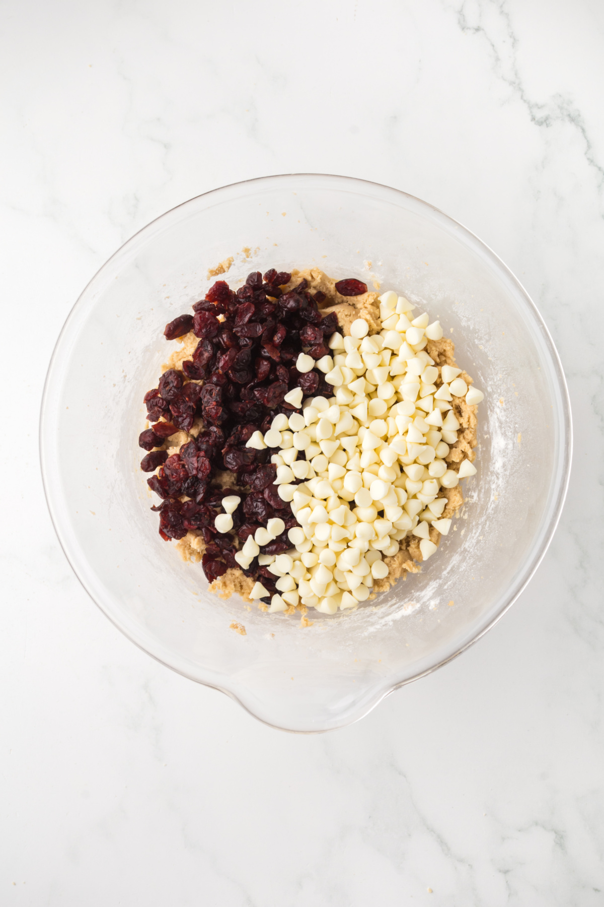 The white chocolate chips and dried cranberries folded into the batter.