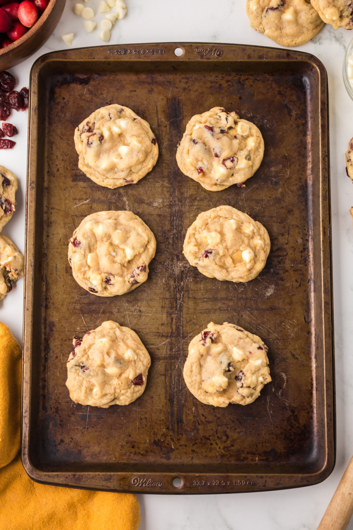 Cookies cooling on a baking sheet.