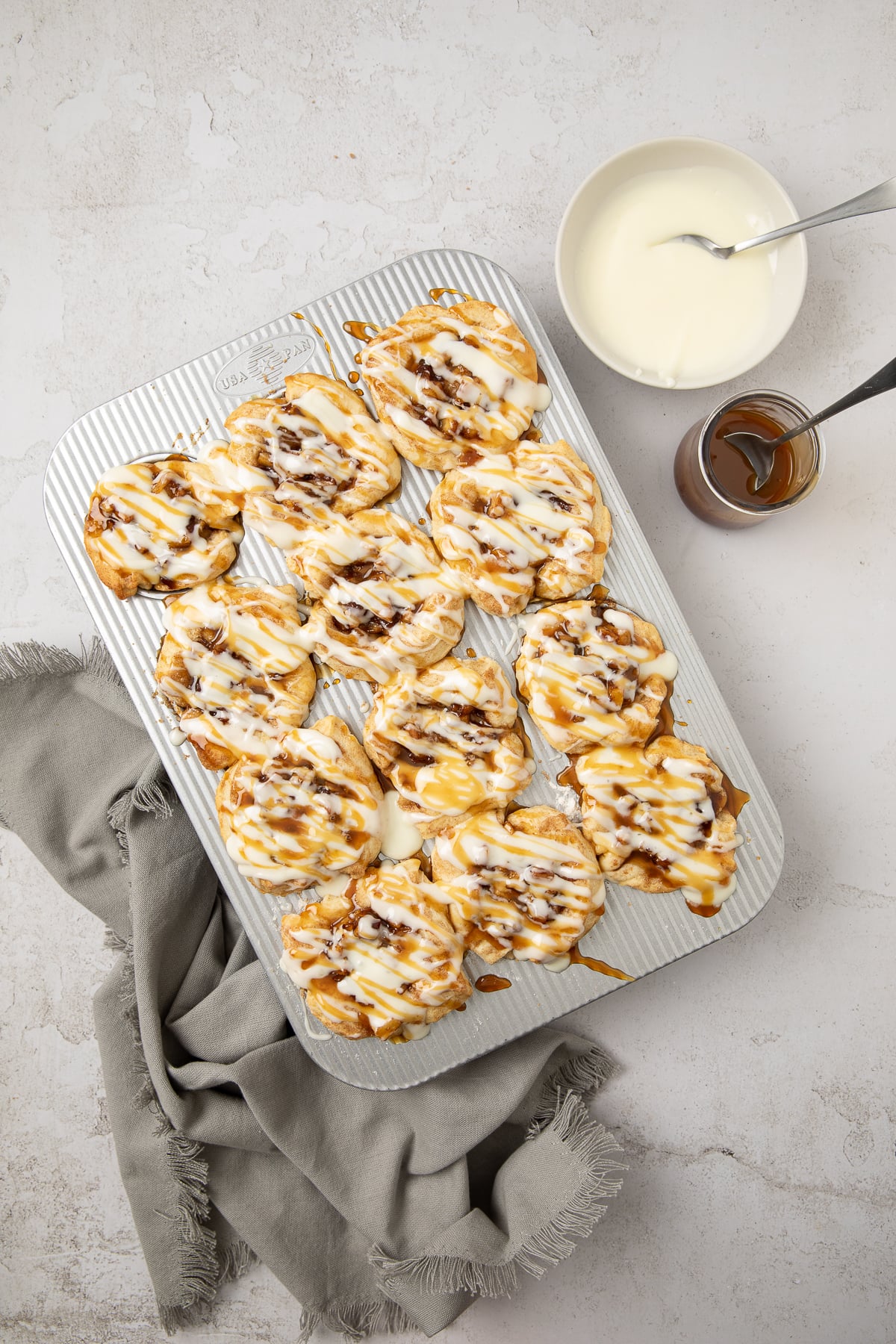 Icing drizzled on the bites.