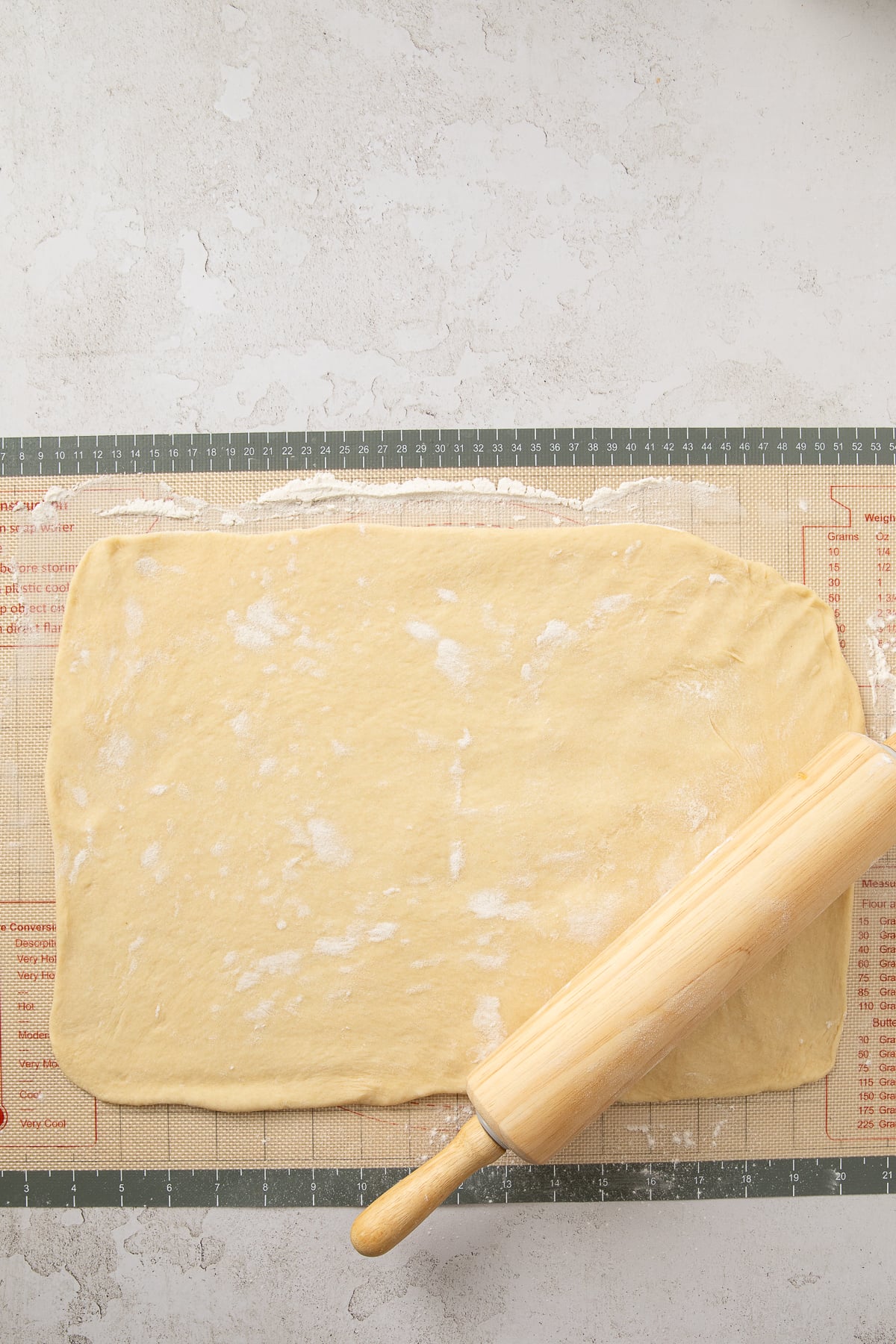 Dough rolled out into a rectangle.