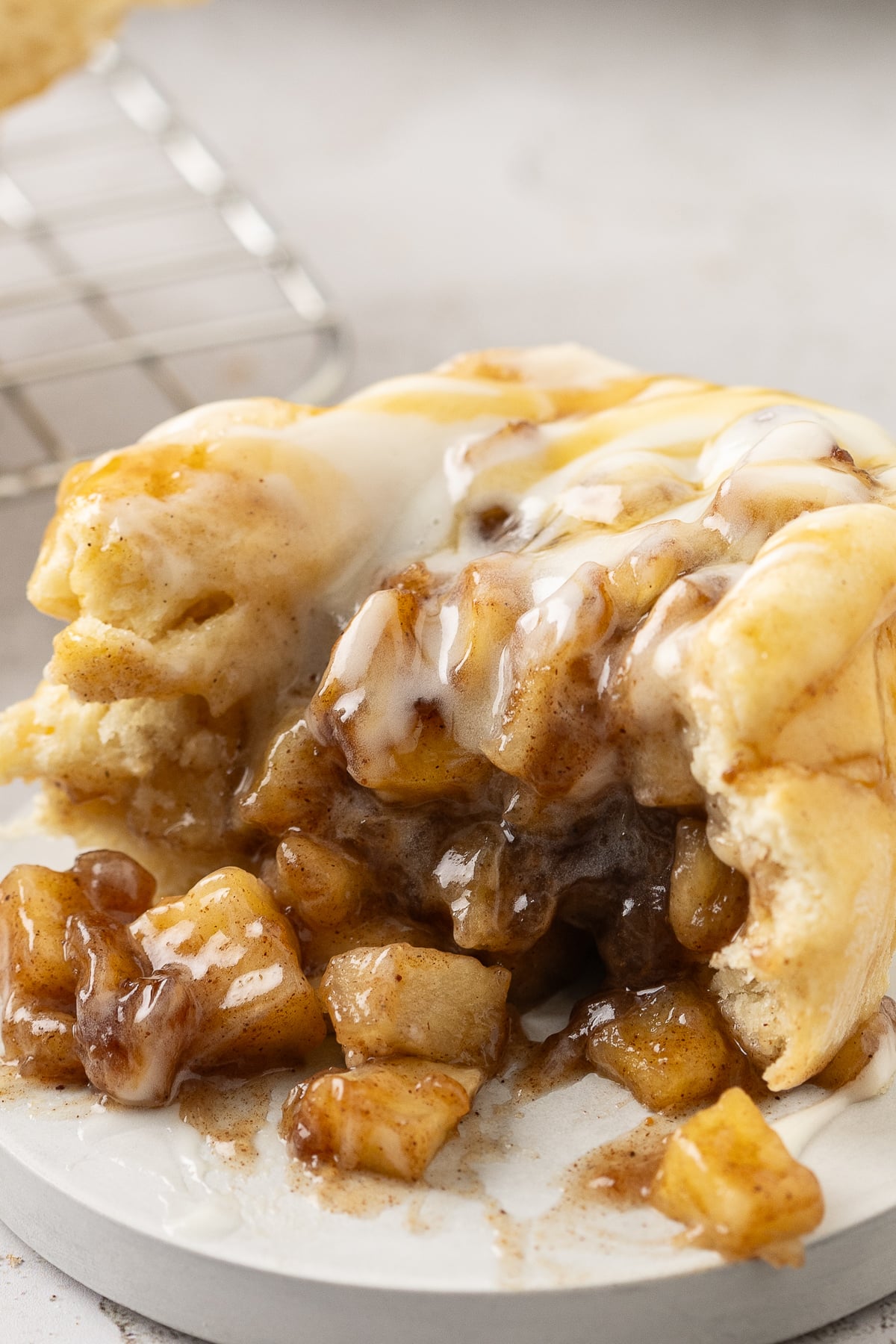 Apple pie bite on a plate.