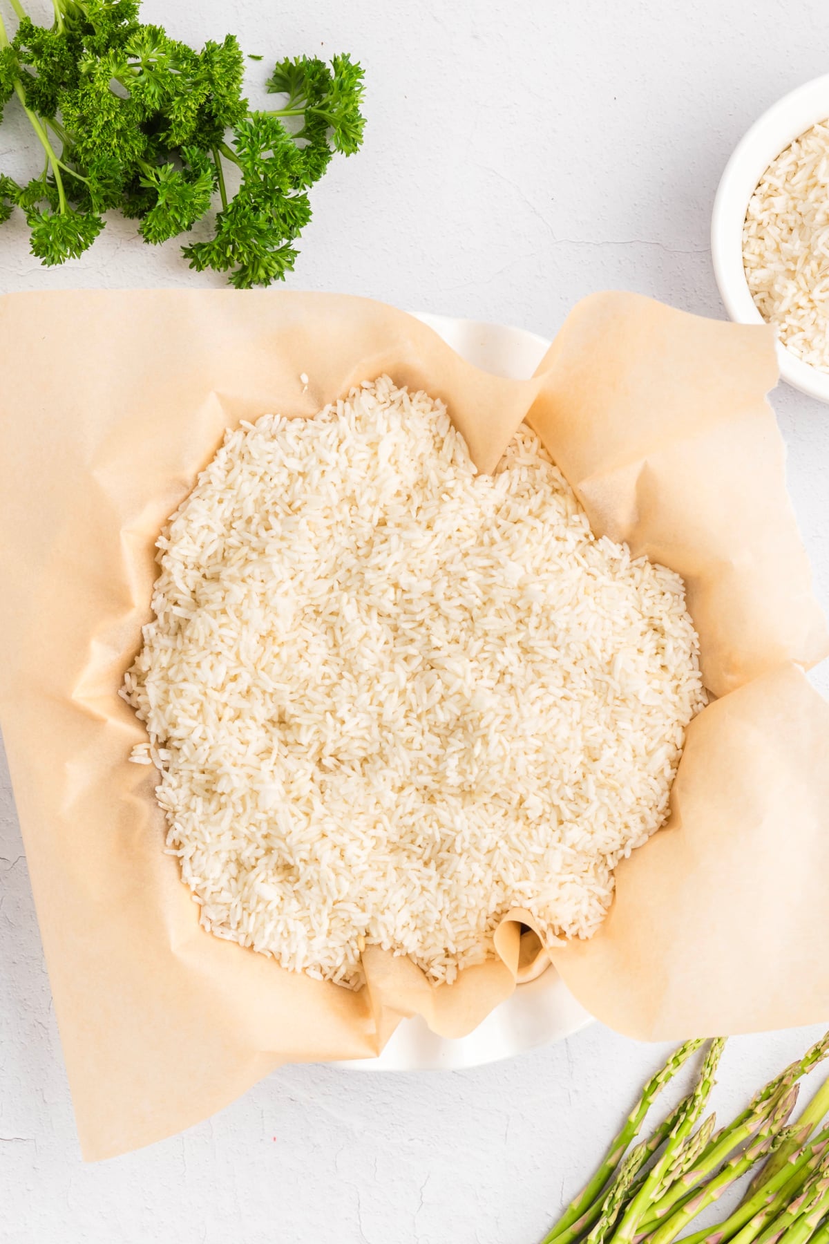 Rice added to weigh the pie crust down.
